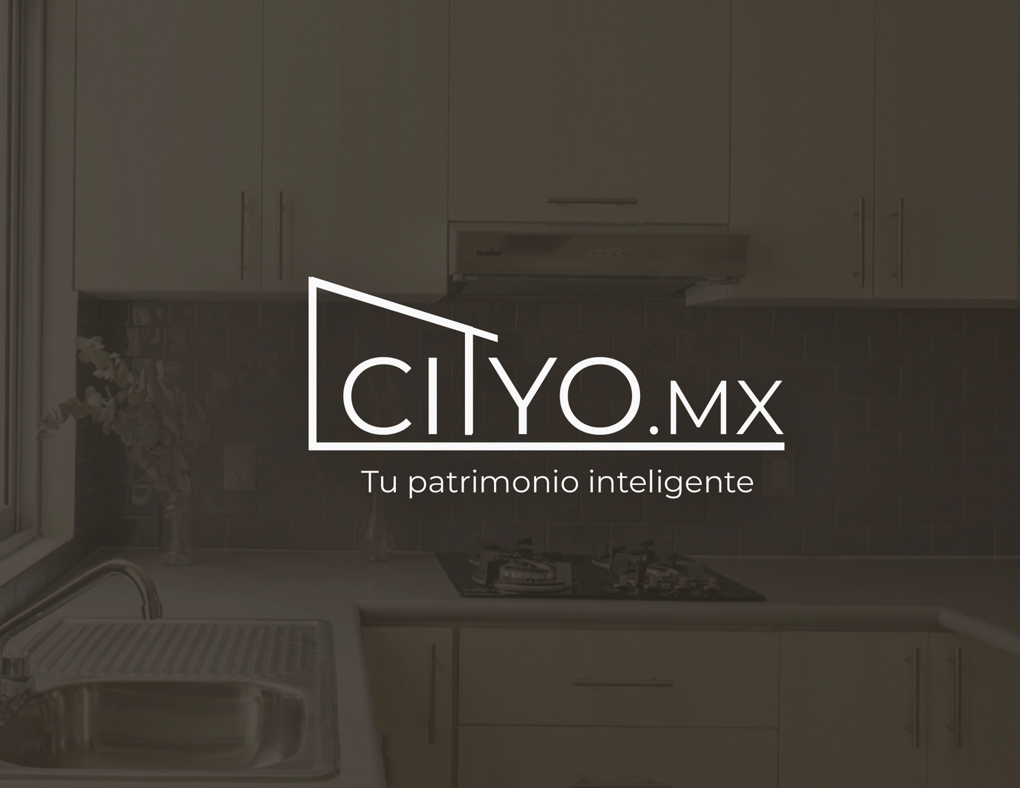 Logo de City-O en blanco sobre una foto panorámica de una cocina