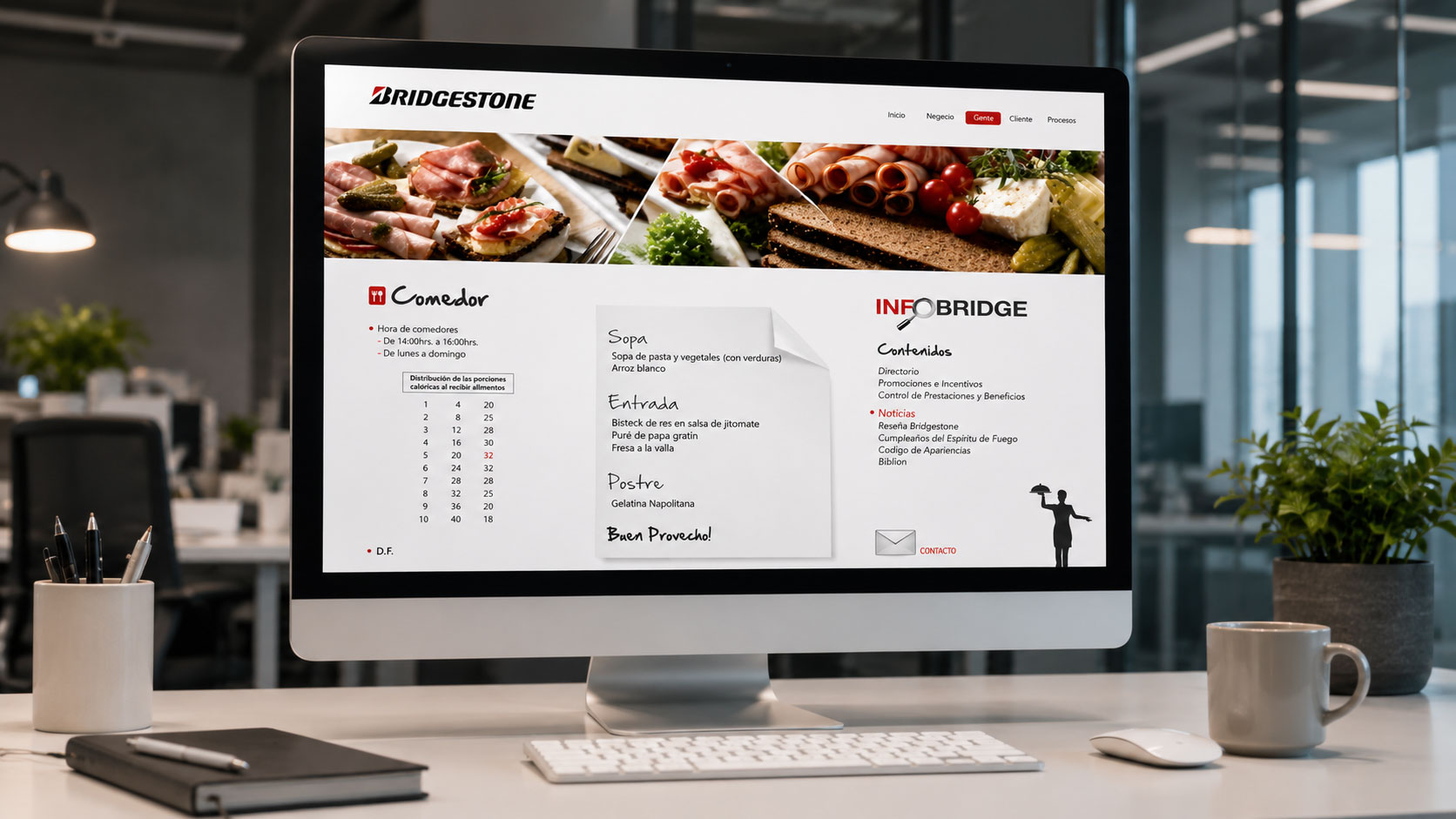 Computadora de escritorio con la sección "Comedor" del portal InfoBridge, con menú del día y fotografías de comida
