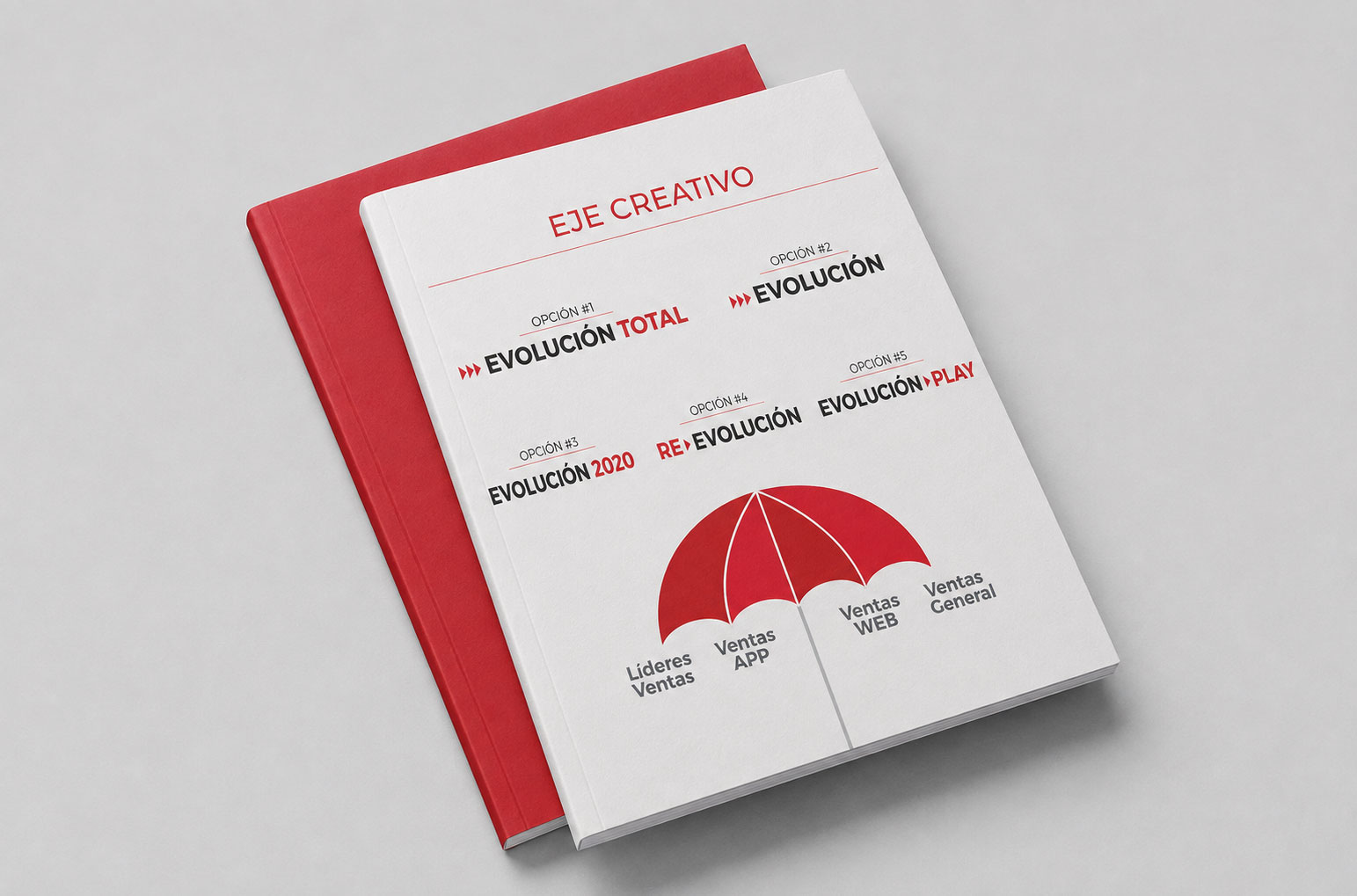 Libreta del eje creativo con las opciones de nombre de la campaña y una sombrilla como concepto paraguas